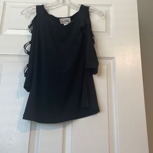 Black shirt with open sleeves